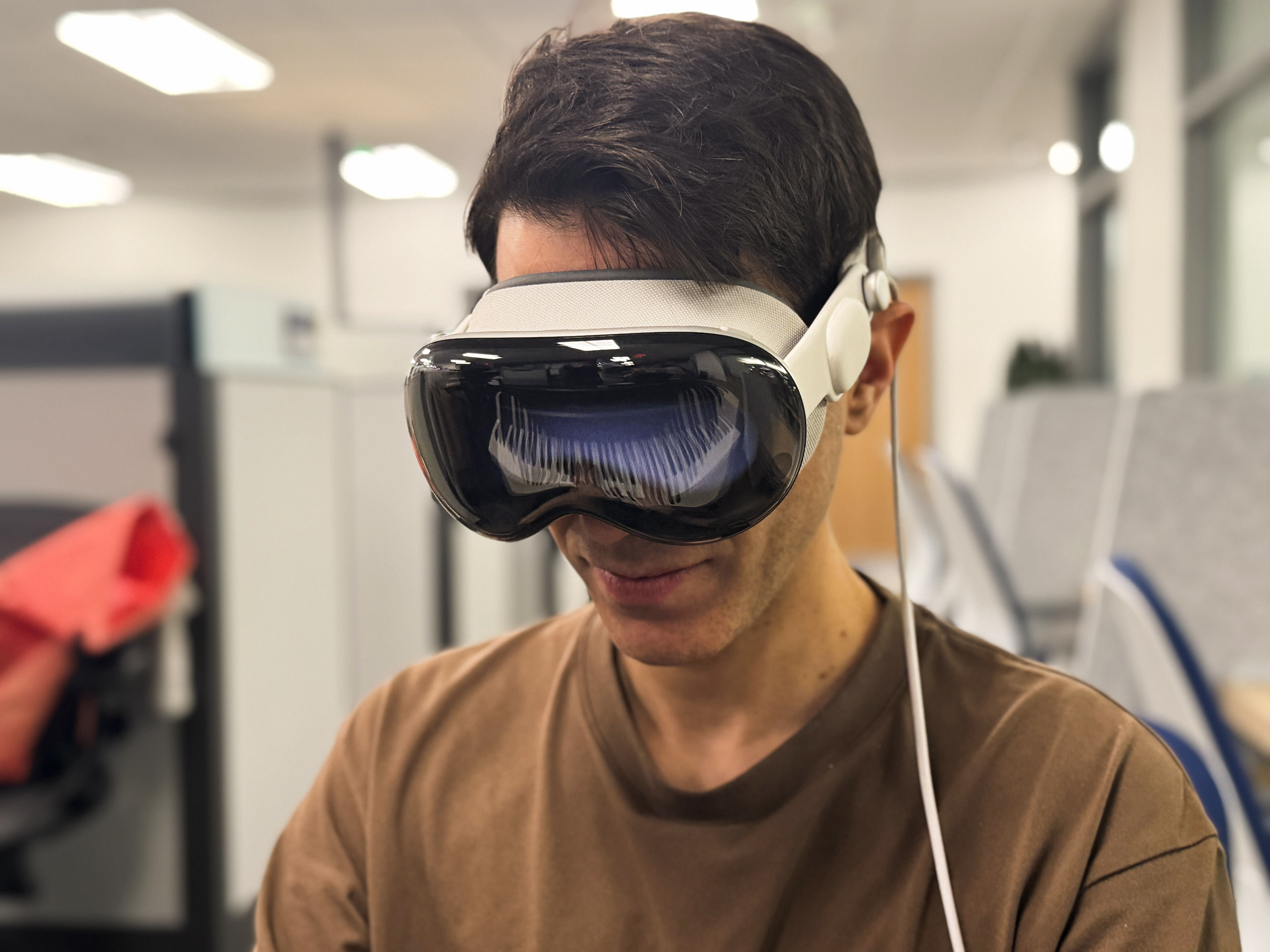 Anıl Çamcı wearing Apple Vision Pro during a testing session